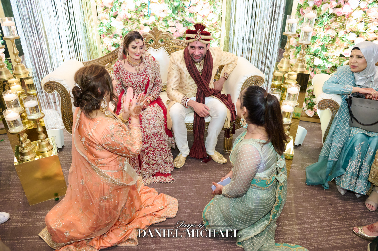 Elegant Muslim Wedding Negotiation Scene in Cincinnati's Hilton Hall of Mirrors with Professional Photographer